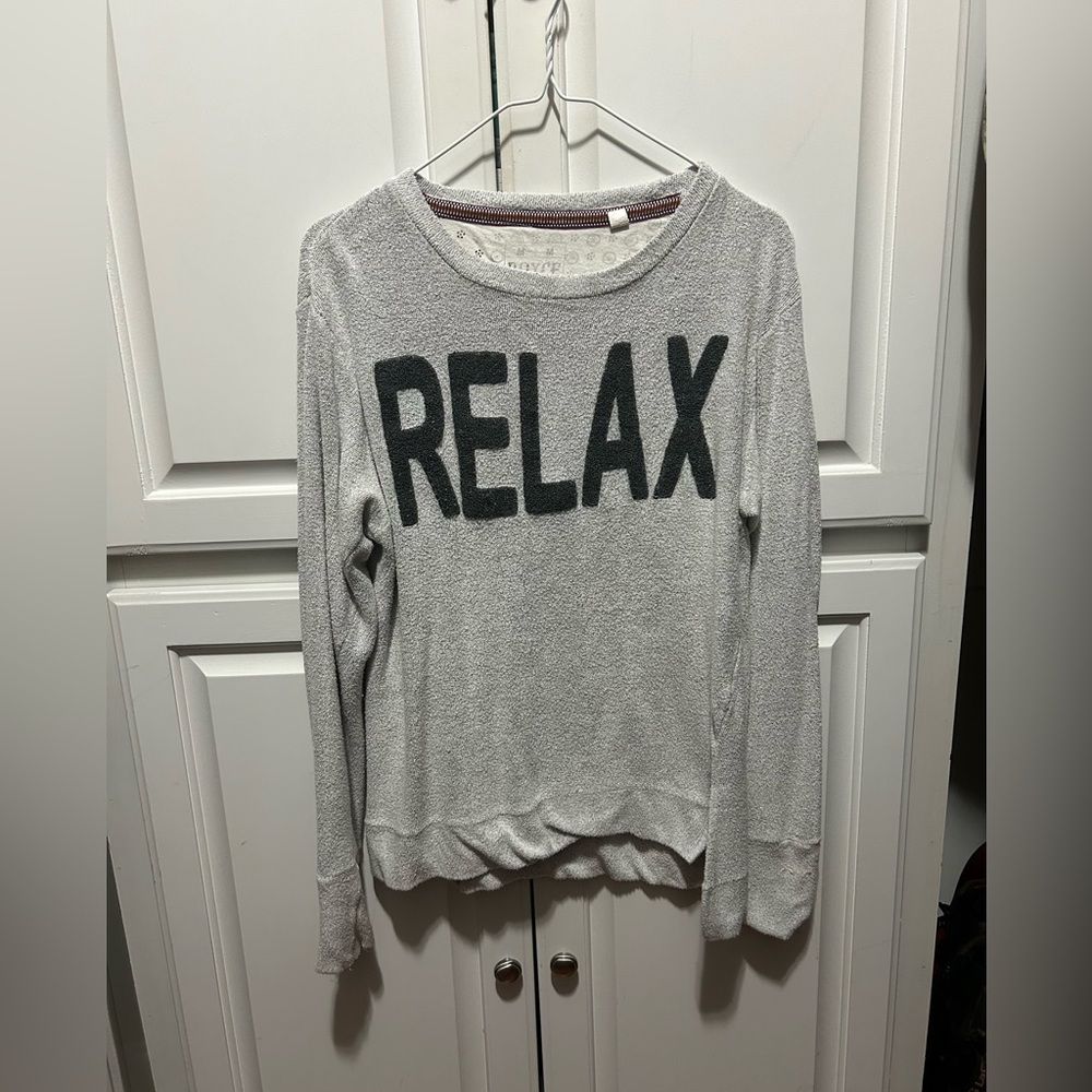 Long sleeve. Sweater type material.